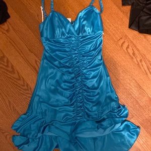 gorgeous teal dress made by city triangles